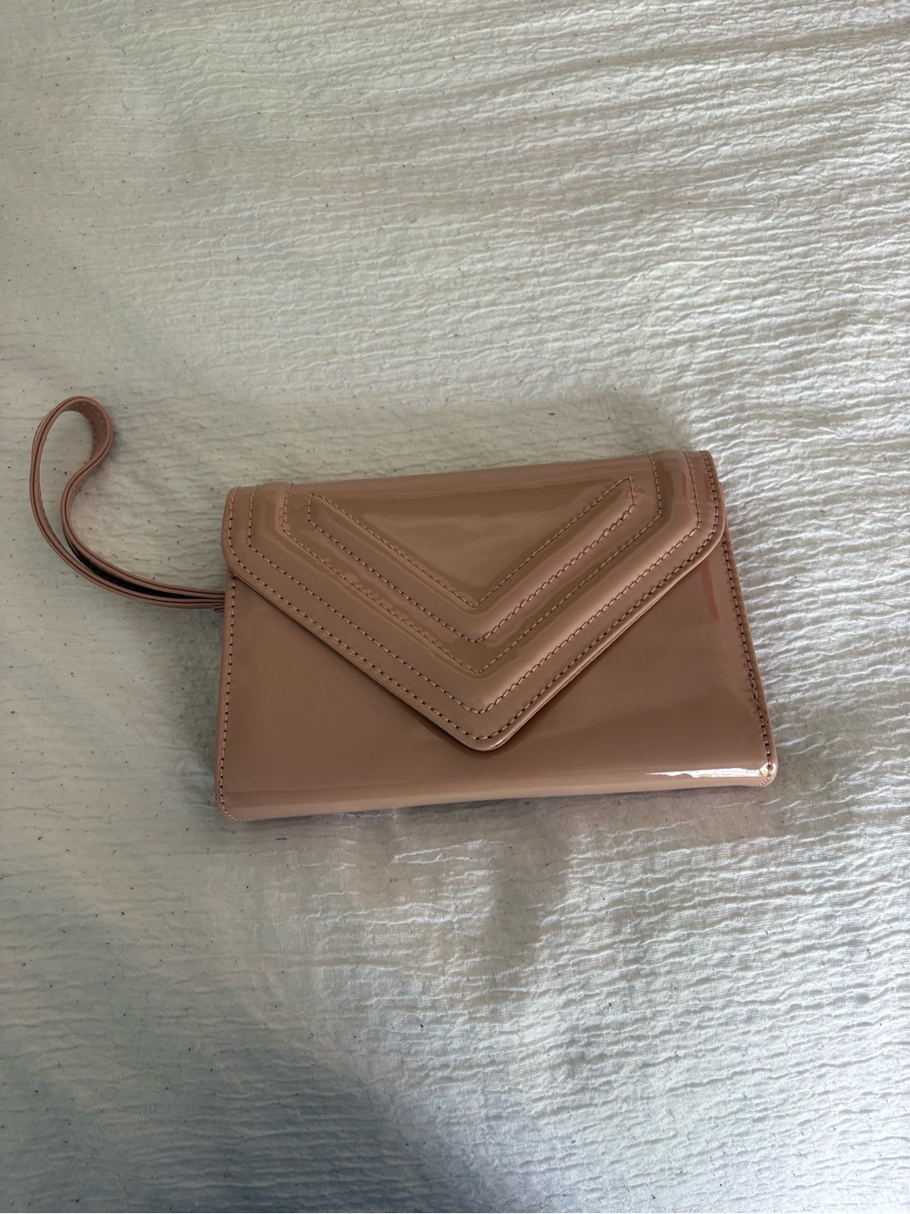 Aldo Patent Envelope Wristlet in Nude Pink